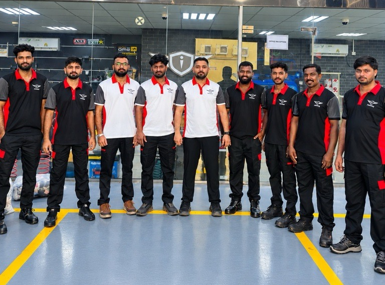 The Iconic Performance Garage team together inside the workshop